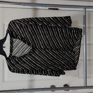 The limited sheer black white strips top